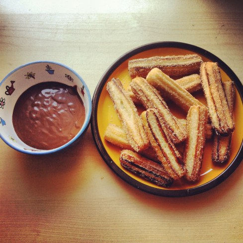 Homemade churros with chocolate dipping sauce